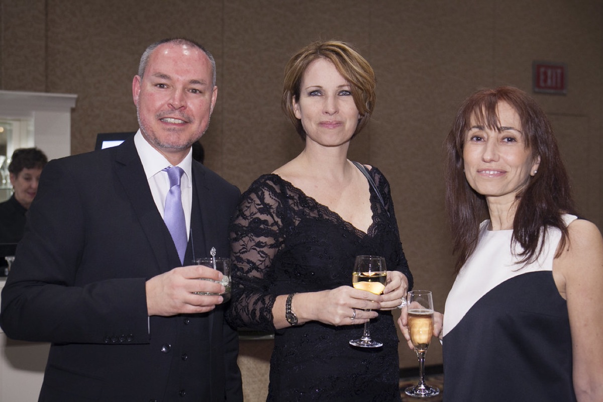 Wine taster receiving award in formal setting